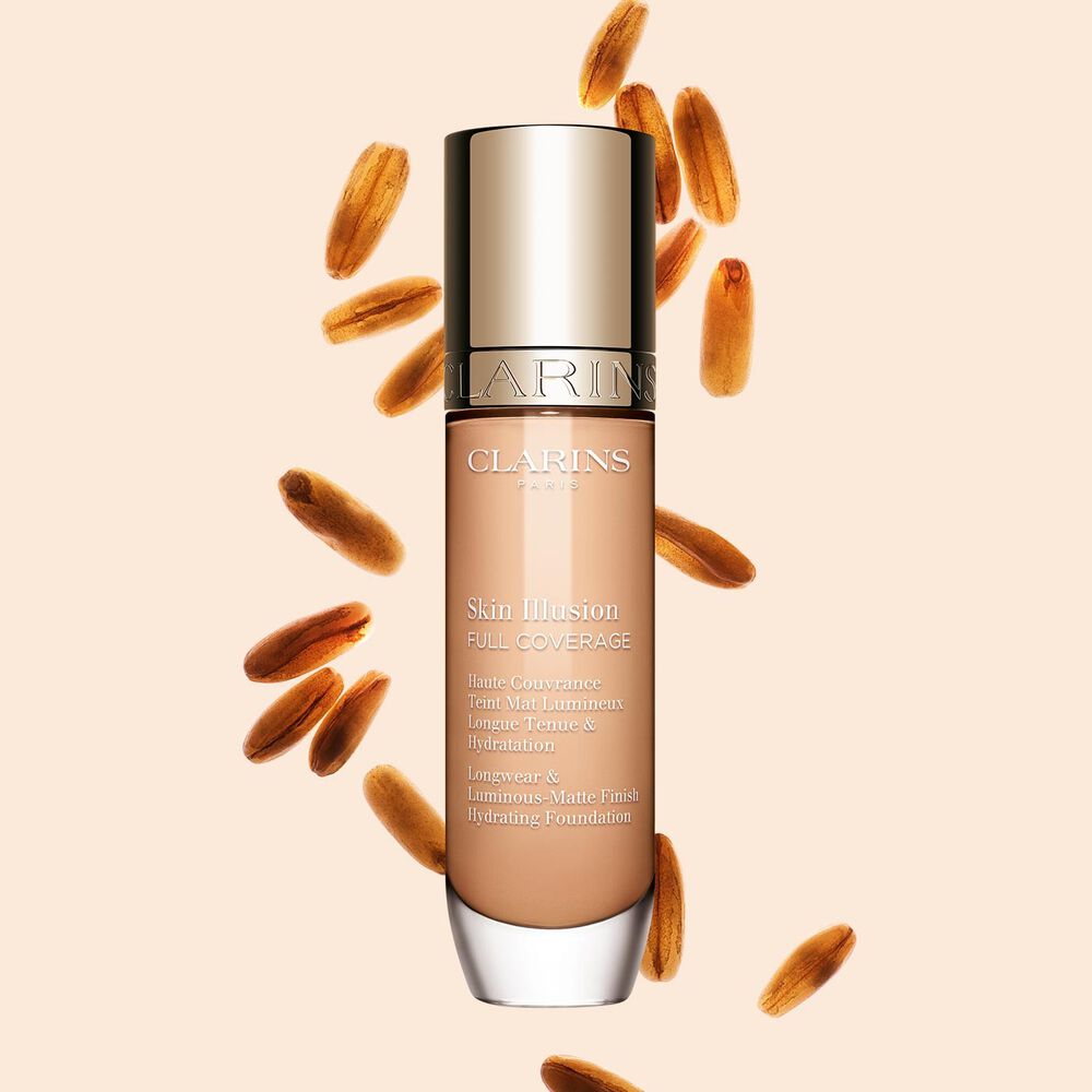 Skin Illusion Couvrance Totale Clarins pr&eacute;sente son design &eacute;pur&eacute; et son emballage &eacute;clatant, le fond de teint id&eacute;al pour un teint parfait et naturel.