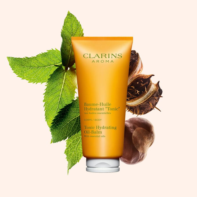 Baume-Huile Hydratant "Tonic" Clarins enrichi en huile de noisette et beurre de karit&eacute; pour une peau intens&eacute;ment nourrie et tonifi&eacute;e au quotidien.