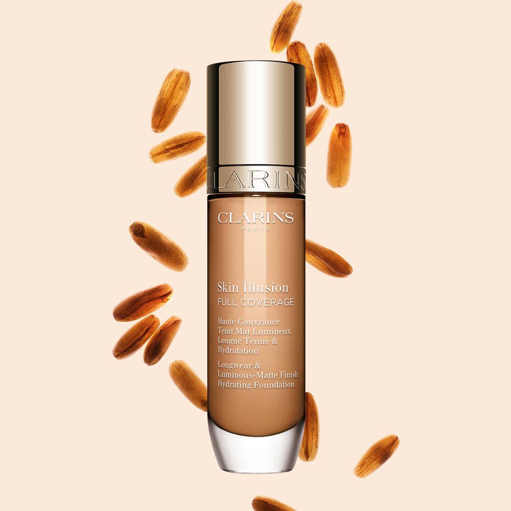 Skin Illusion Couvrance Totale Clarins pr&eacute;sente son design &eacute;pur&eacute; et son emballage &eacute;clatant, le fond de teint id&eacute;al pour un teint parfait et naturel.
