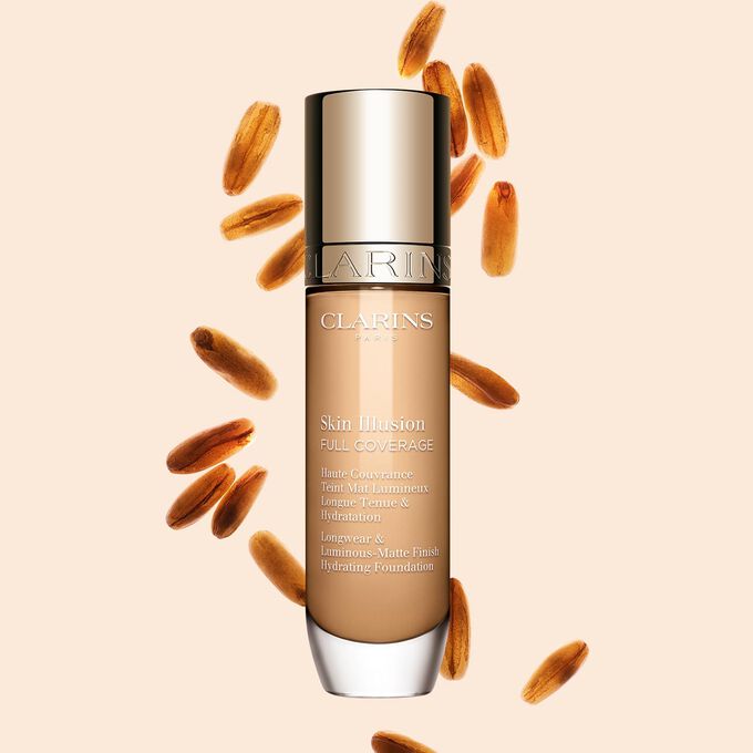 Skin Illusion Couvrance Totale Clarins pr&eacute;sente son design &eacute;pur&eacute; et son emballage &eacute;clatant, le fond de teint id&eacute;al pour un teint parfait et naturel.
