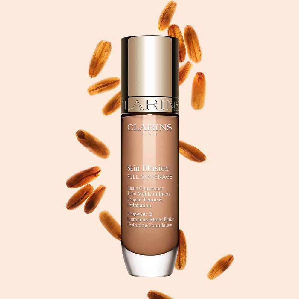 Skin Illusion Couvrance Totale Clarins pr&eacute;sente son design &eacute;pur&eacute; et son emballage &eacute;clatant, le fond de teint id&eacute;al pour un teint parfait et naturel.