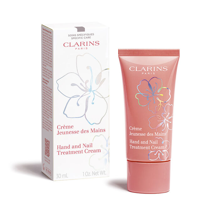 Photo d'un tube de la Crème Mains Floraison Féerique Clarins en édition limitée avec son élégant emballage secondaire recyclable.