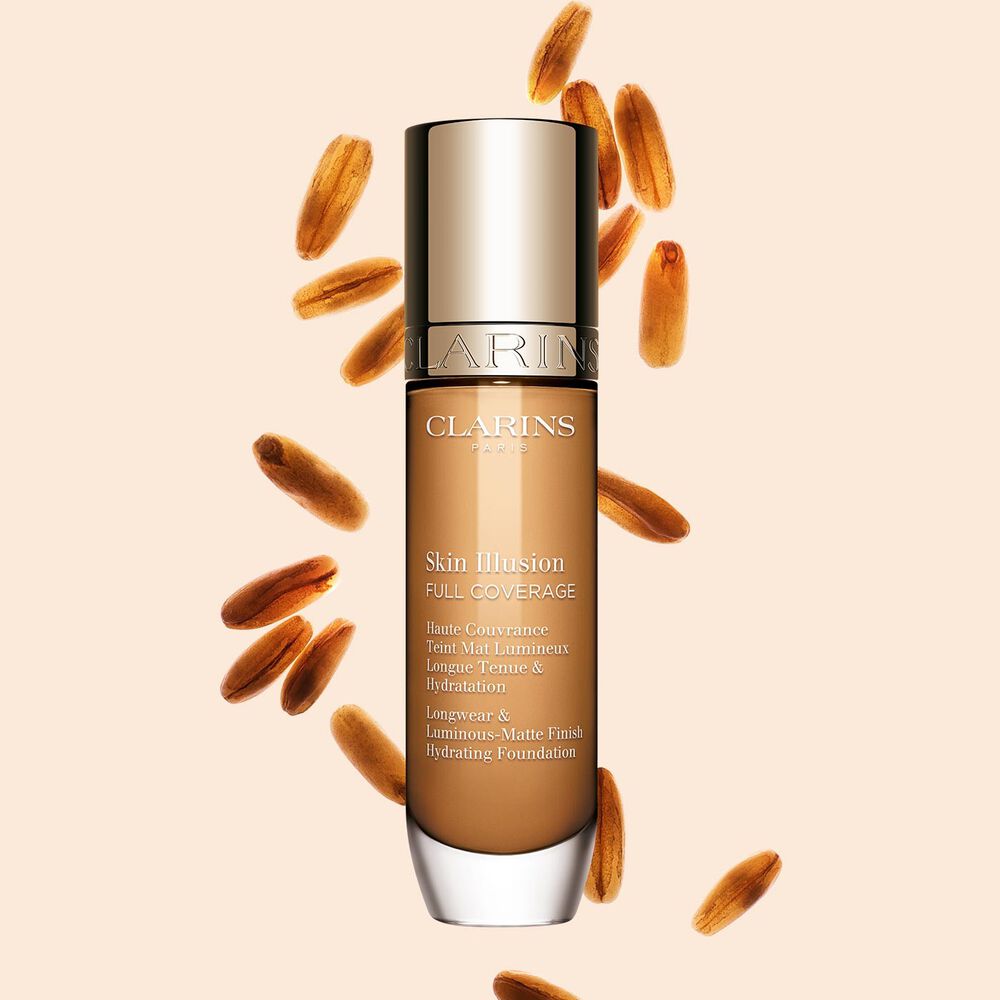 Skin Illusion Couvrance Totale Clarins pr&eacute;sente son design &eacute;pur&eacute; et son emballage &eacute;clatant, le fond de teint id&eacute;al pour un teint parfait et naturel.