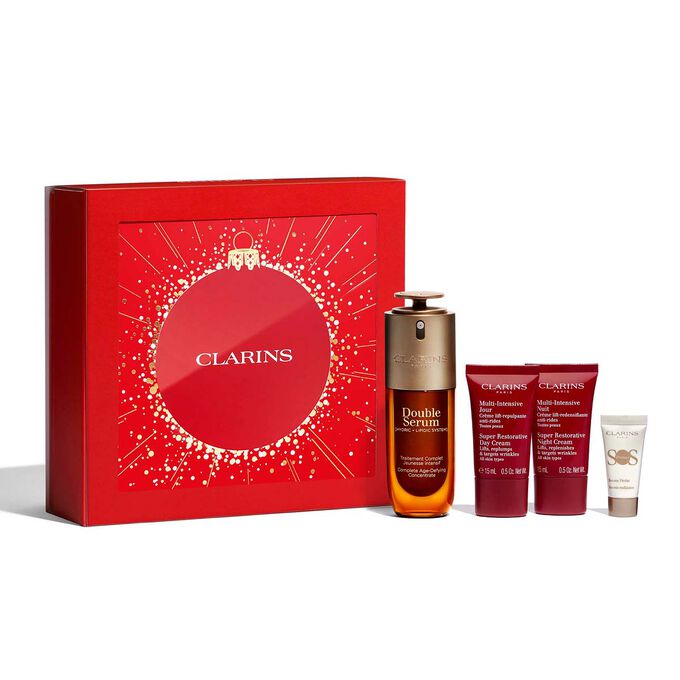 Plan produit du coffret de No&euml;l Double Serum de Clarins, comprenant les produits incontournables pour une routine de soins anti-&acirc;ge.