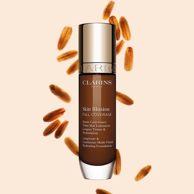 Skin Illusion Couvrance Totale Clarins pr&eacute;sente son design &eacute;pur&eacute; et son emballage &eacute;clatant, le fond de teint id&eacute;al pour un teint parfait et naturel.