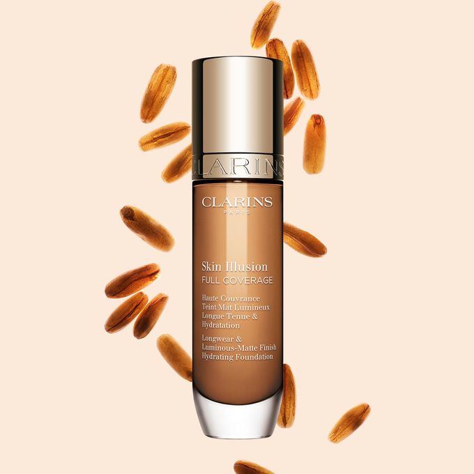 Skin Illusion Couvrance Totale Clarins présente son design épuré et son emballage éclatant, le fond de teint idéal pour un teint parfait et naturel.