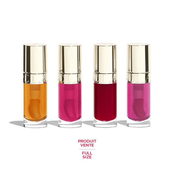 Photo des produits du coffret cadeau Lip Comfort Oil de Clarins : 4 encres à lèvres grand format de couleurs orange, fuchsia, violet et rose.