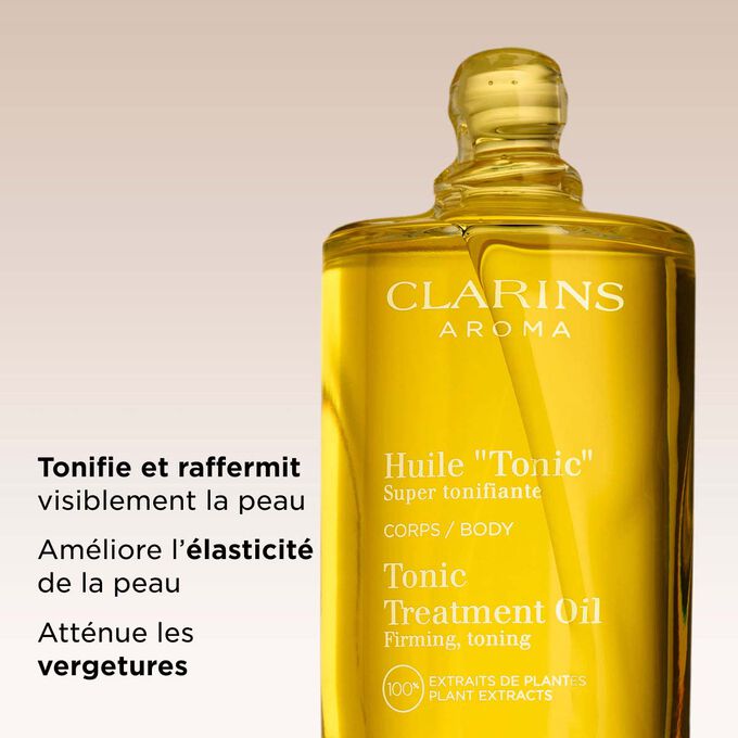 Huile "Tonic" Clarins pour tonifier et raffermir la peau visiblement tout en r&eacute;duisant les vergetures, pour une peau lisse et ferme.
