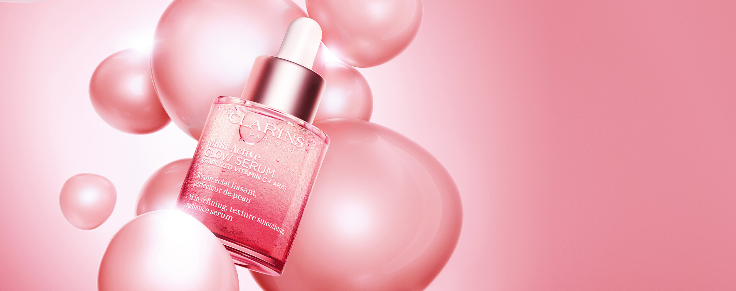 Photo produit du sérum Multi-Active GLOW sur fond de campagne