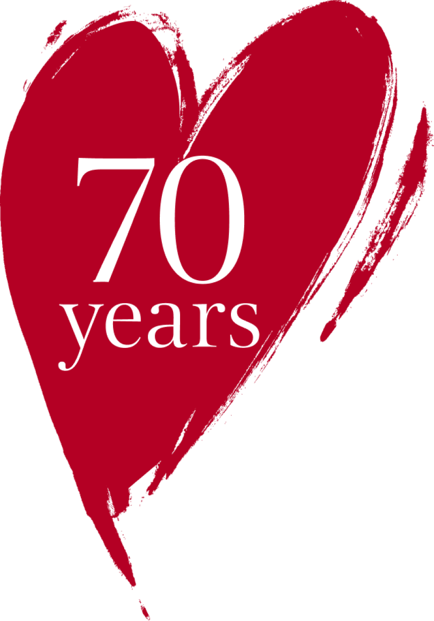 Red heart with 70 years written inside which is the logo to celebrate Clarins anniversary